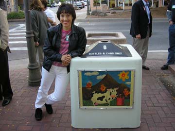 Artist Angie Young with her art on public display